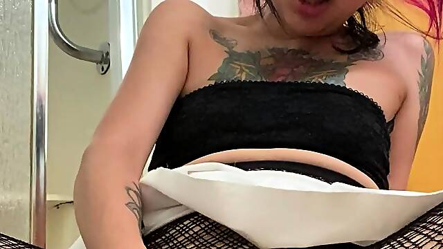 Amateur brunette strips and toys pussy in solo