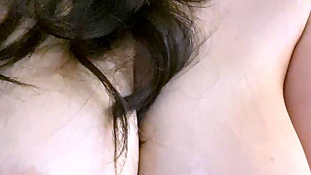 Busty curly brunette with big boobs fucks on couch