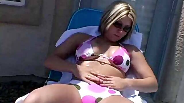 Hot Blonde Paige Rubbing Sun Lotion on Her Boobs