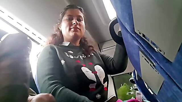 Amateur busty brunette MILF sucks and jerks dick in the bus