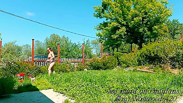 Amateur nudist MILF strips and mows the lawn