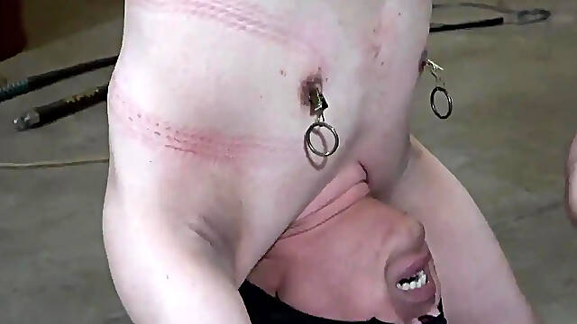 Dominatrix Mistress Jyun clamps and pulls nipples