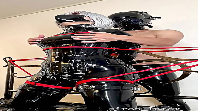 Siron is tied to the bed and thoroughly bondage from behind
