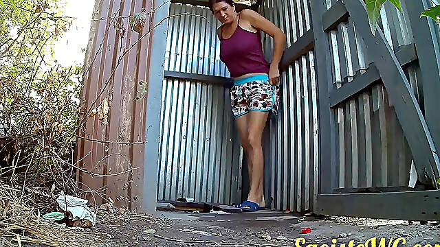 Watching the pissing of a village young lady in an antediluvian toilet