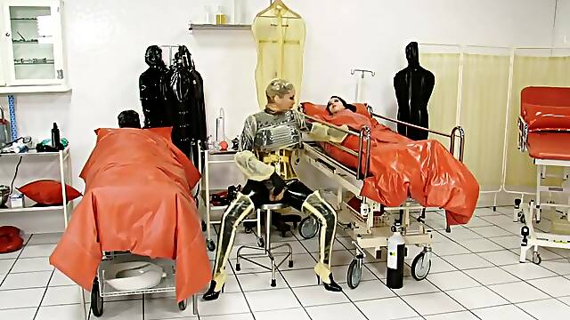 Catheter strapon games in the rubber clinic