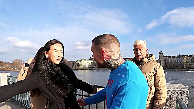 Two girls, Zuzu Sweet and Lady Gang, share a big cock in an intense threesome.