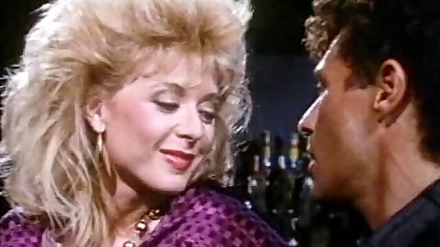 Horny blond babe Nina Hartley gets banged in the bar