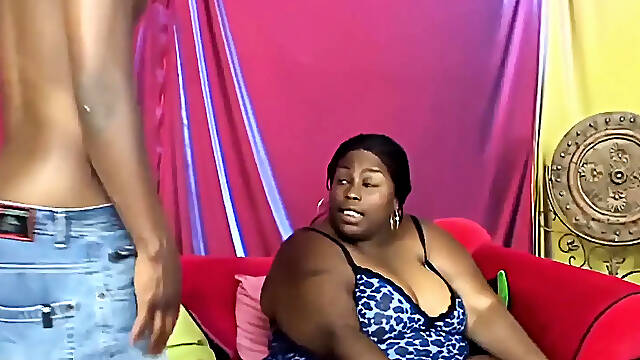 Corpulent Ebony Woman Sucks a Very Large Dick