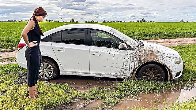 CAR STUCK Ellie got stuck in the mud when she tried to turn around