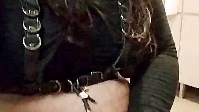 Bondage play with a mask and handcuffs