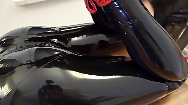 Playing with Latex Lea in Bondage